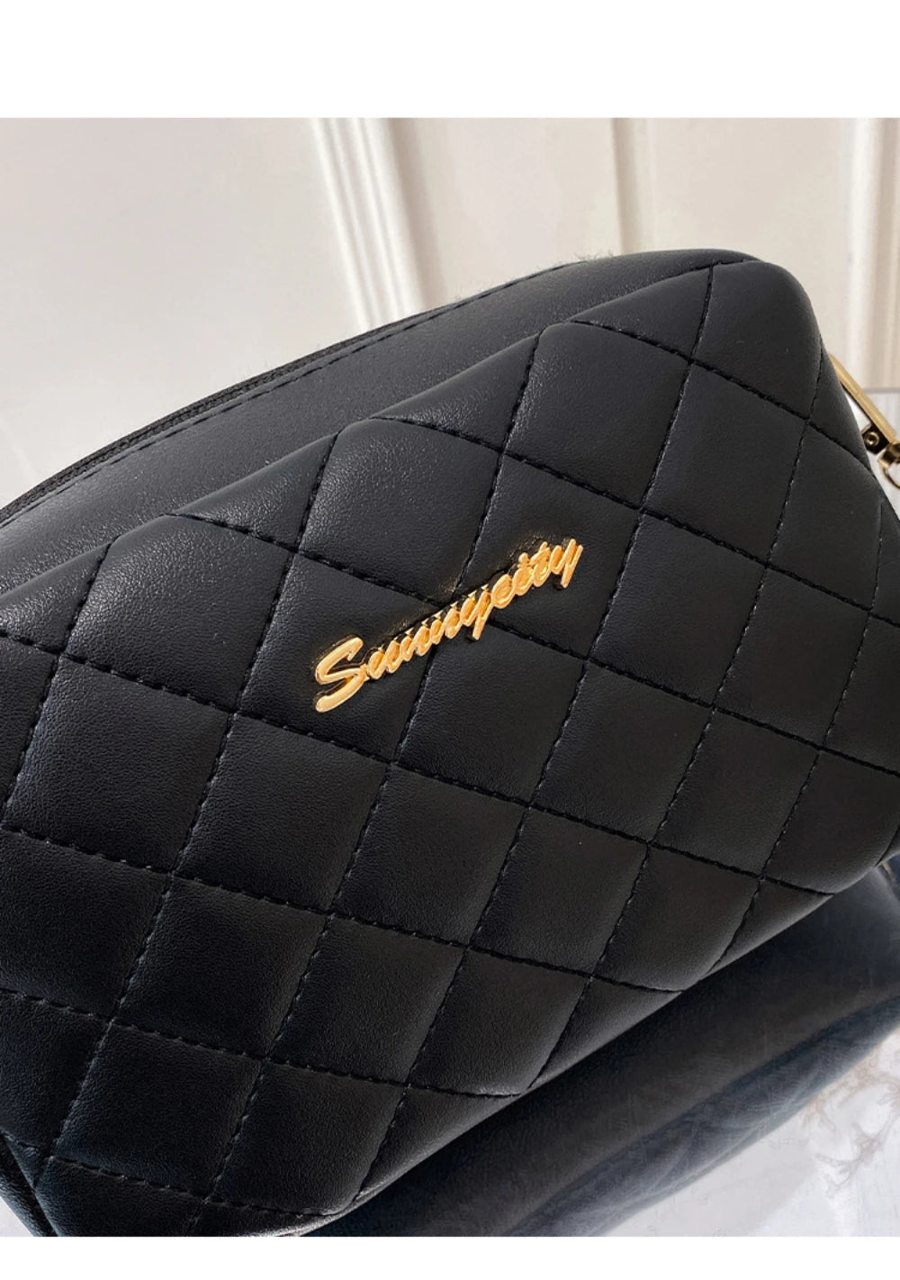 Elegante gesteppte Umhängetasche