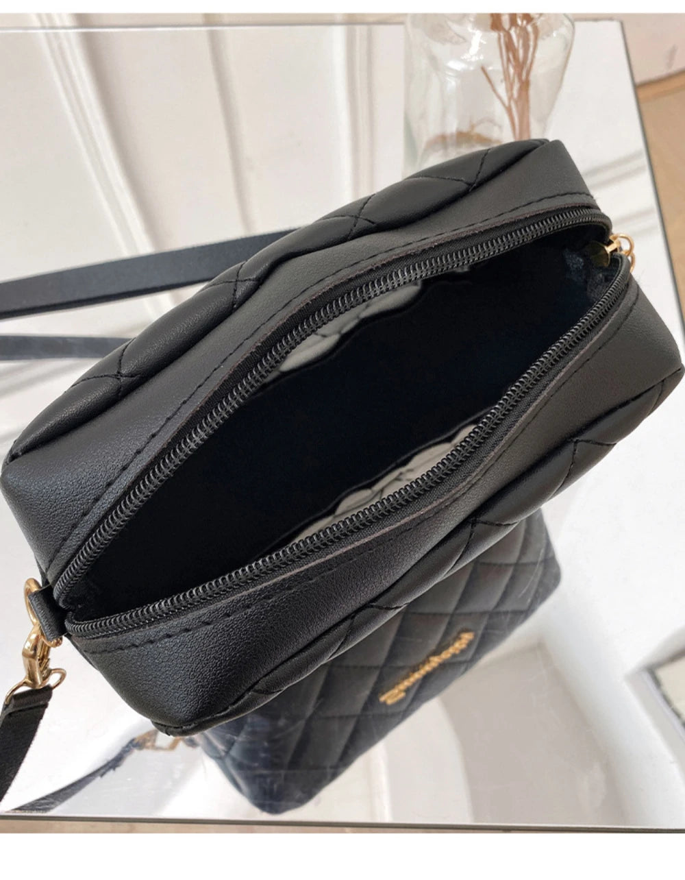 Elegante gesteppte Umhängetasche